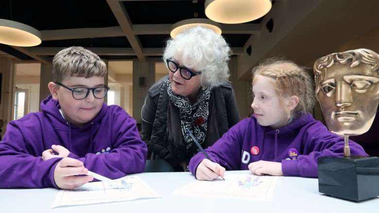 Costume Designer Jo Conti with young people at the Into Film Festival 2022.