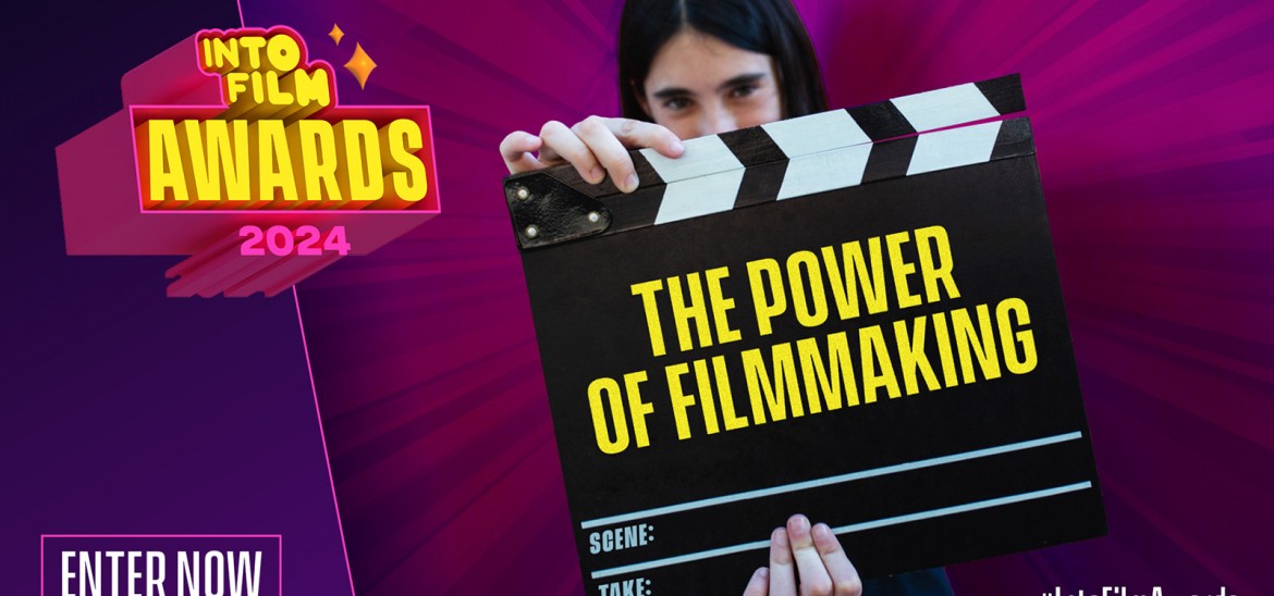 Child holding clapper board that says 'the power of filmmaking' 