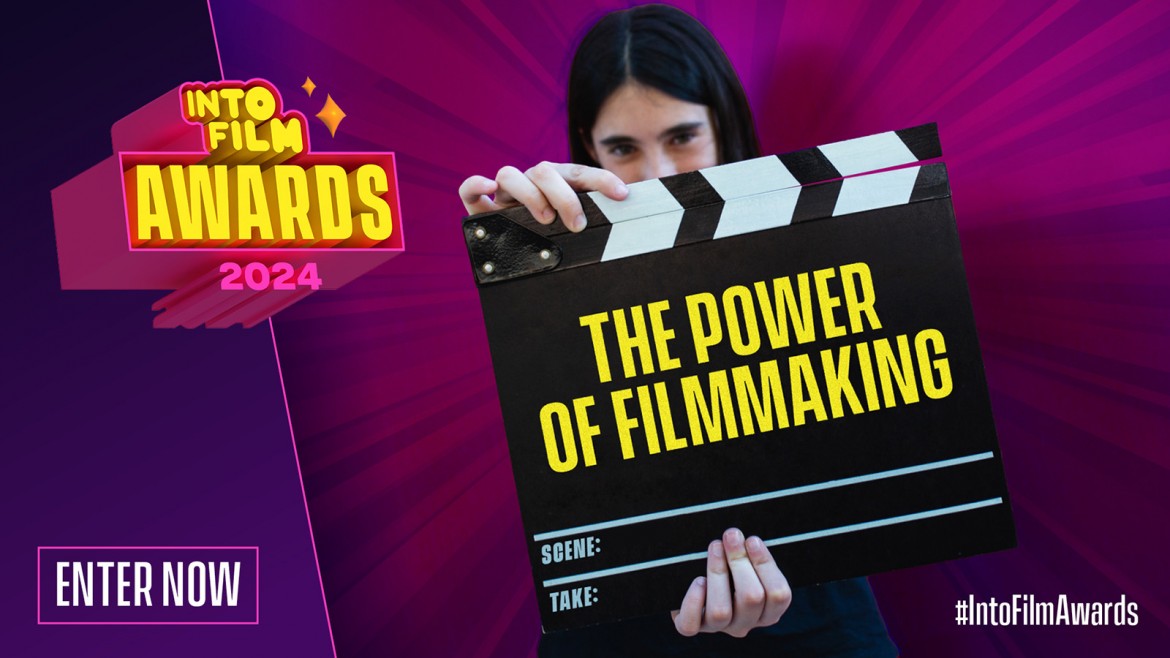 Child holding clapper board that says 'the power of filmmaking' 