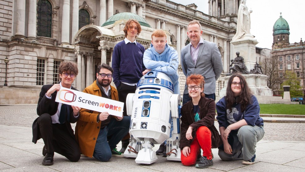 ScreenWorks participants pose proudly with their self-made R2-D2.