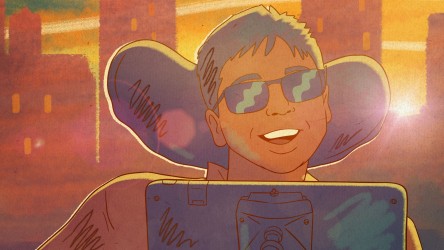 Samuel a young man in a wheelchair wearing sunglasses smiling