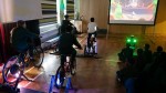 Children power their own Into Film Festival screening using bicycles.