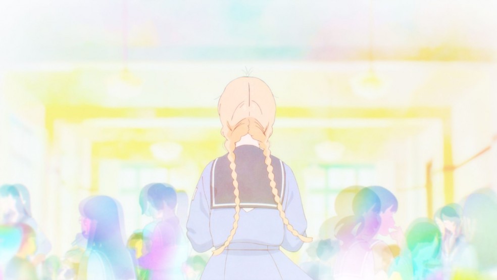 A girl with long blonde braids walks through a room with bright colours.