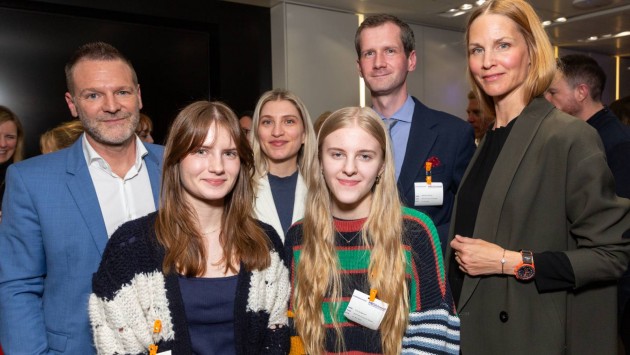 Young filmmakers Christina and Eva with representatives from Swatch.