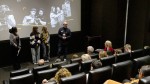 Young filmmakers Christina and Eva, and teacher Ben Cutting, address guests