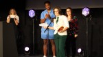 Best Documentary winner Rosie gives a speech on stage