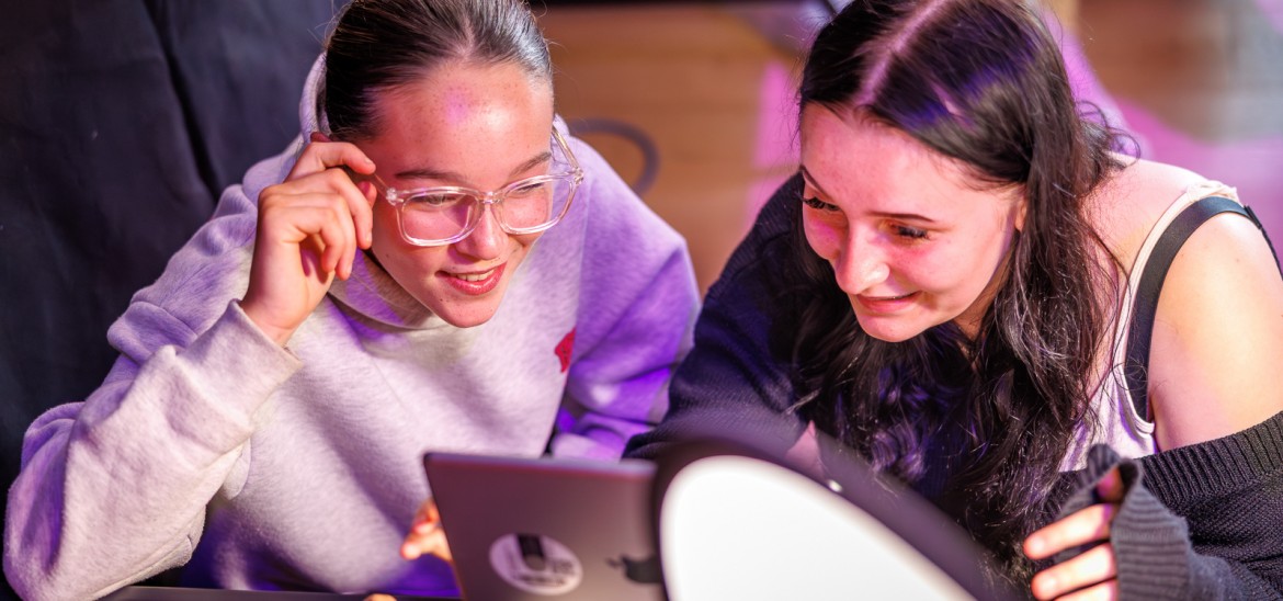 Two girls try filmmaking during a work experience session in Preston