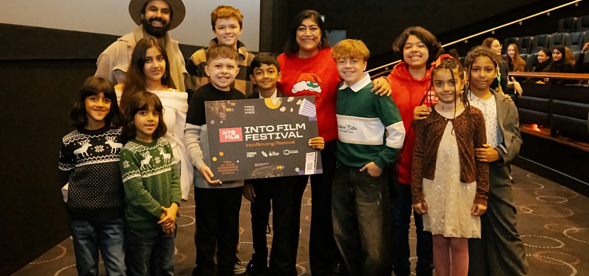 Gurinder Chadha and Kunal Nayyar with young people at 'Christmas Karma'