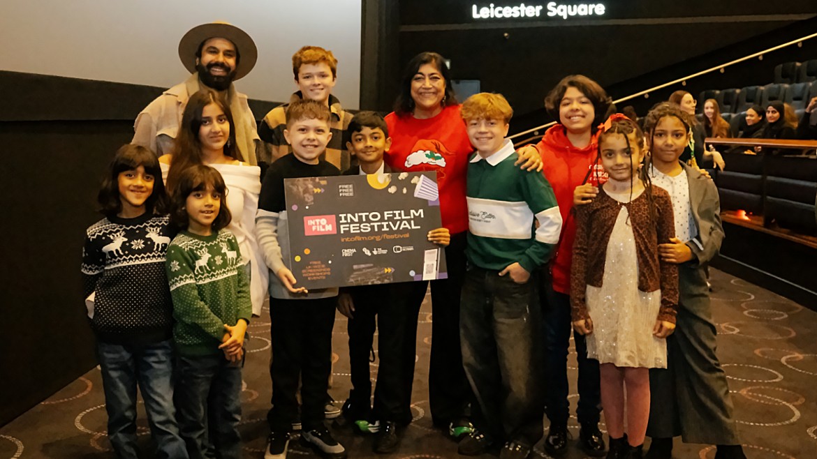 Gurinder Chadha and Kunal Nayyar with young people at 'Christmas Karma'