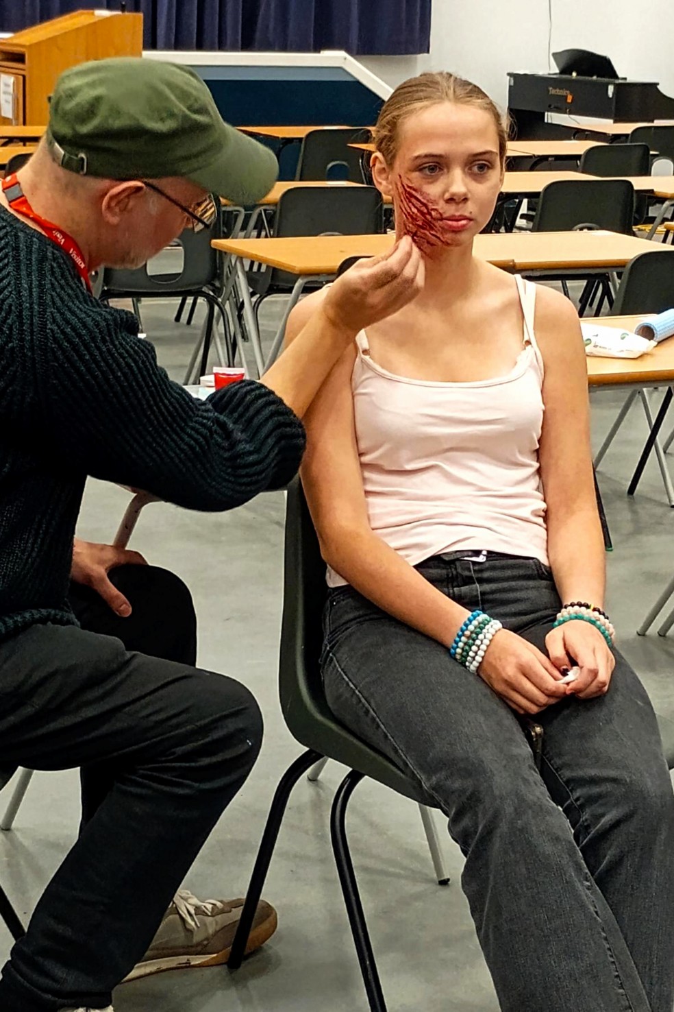A girl in Scotland getting make-up applied during an SFX workshop