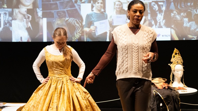 Costume Designer Charlotte Richardson with a young person in costume