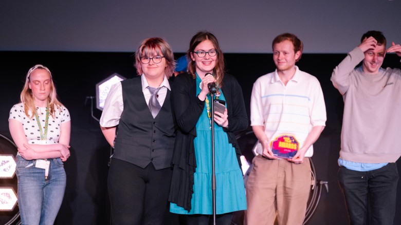 Time for Action winners from SENDing Voices on stage