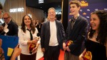 Ones to Watch winners Rosie, Noah and Araminta, with actor Jason Isaacs