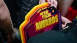 A winner clutching their trophy at the Into Film Awards 2026