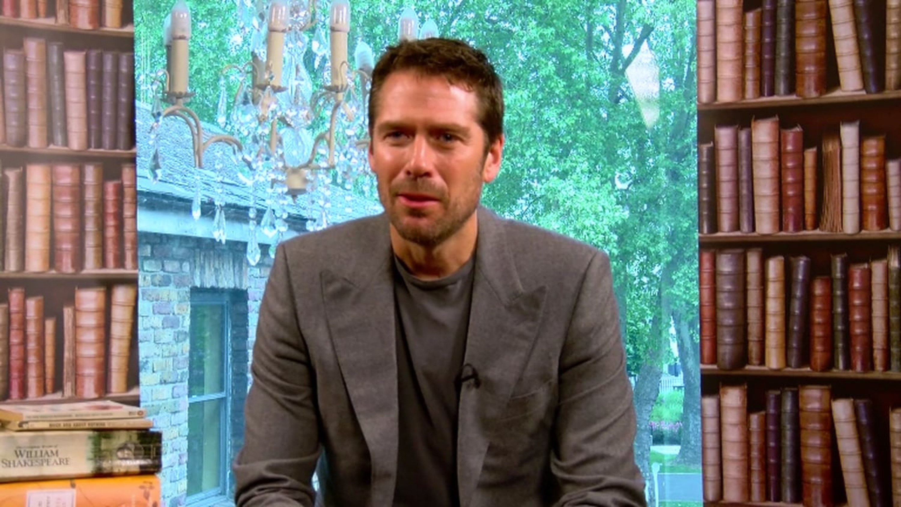 Actor Alexis Denisof who plays Benedict in director Joss Whedon's modern-dr