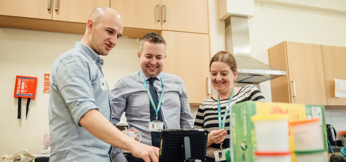 Teachers with iPad (Ferns Academy, Bolton)