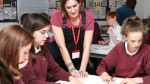 Lydia Fry, Art Director, with students at Calthorpe Park School