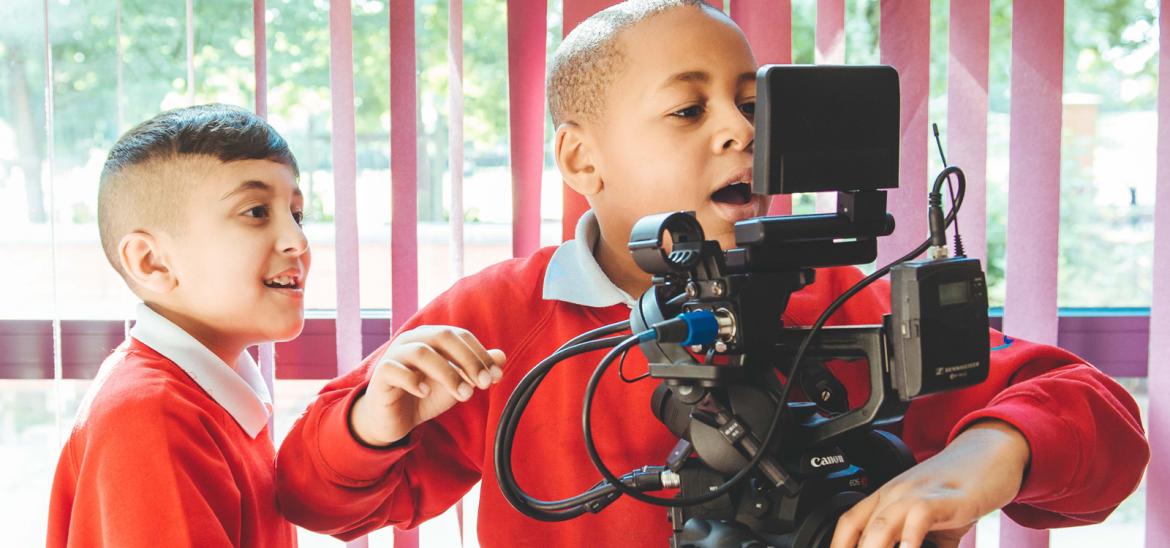 Two boys directing a short film