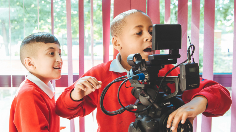 Two boys directing a short film