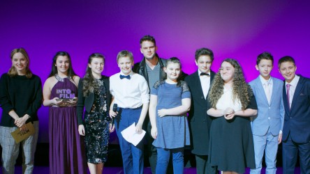 Jeremy Irvine and young people at the Into Film Awards
