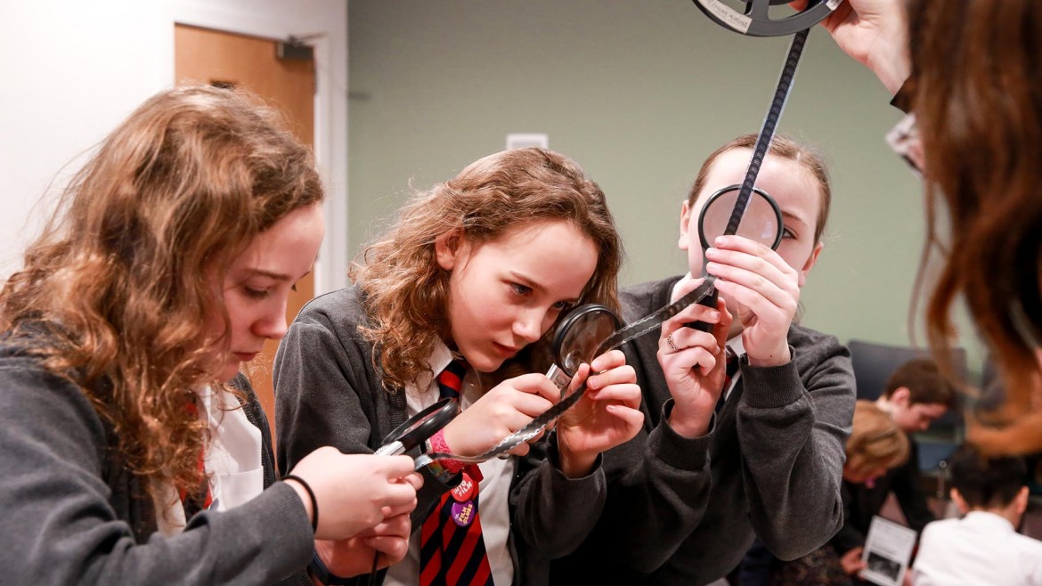 Pupils exploring archive film at Moving Image Archive Scotland