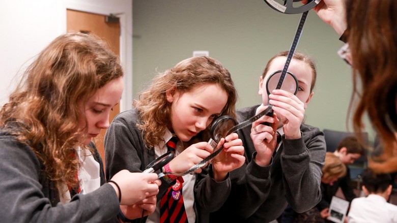 Pupils exploring archive film at Moving Image Archive Scotland