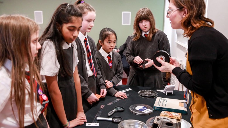 Pupils exploring archive film at Moving Image Archive Scotland