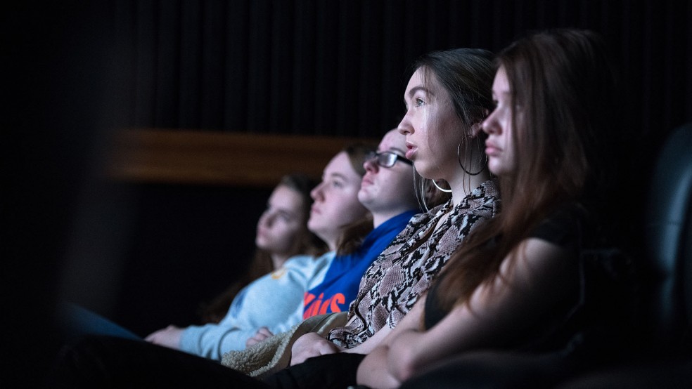 Getting a good audience shot during the pre-film trailers