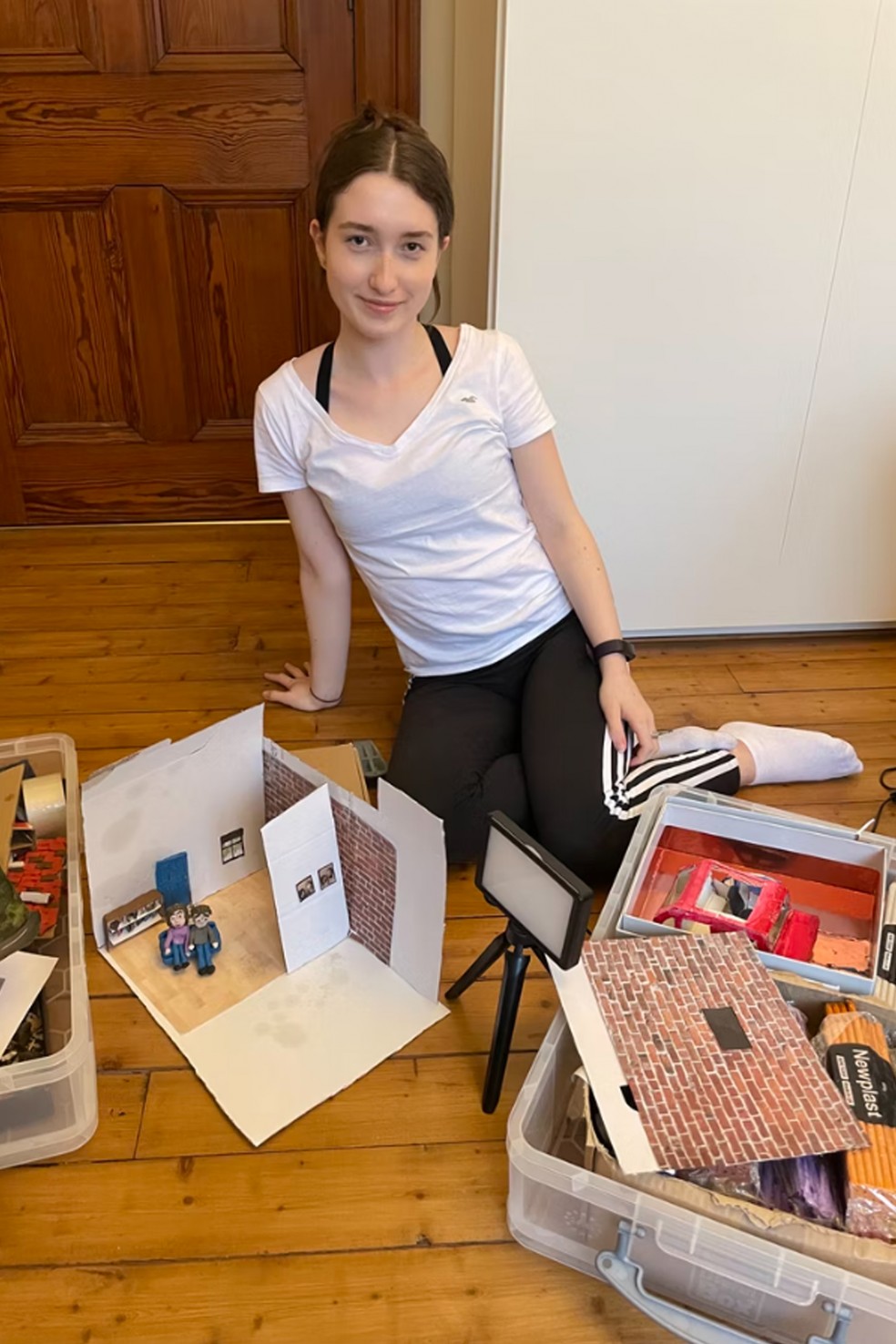 Young filmmaker Zoe, with the home-made sets used on her film 'Mia'