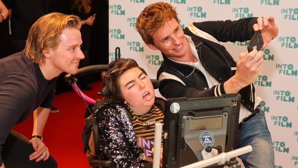 Jack Lowden and Eddie Redmayne take a selfie with young filmmaker Greta