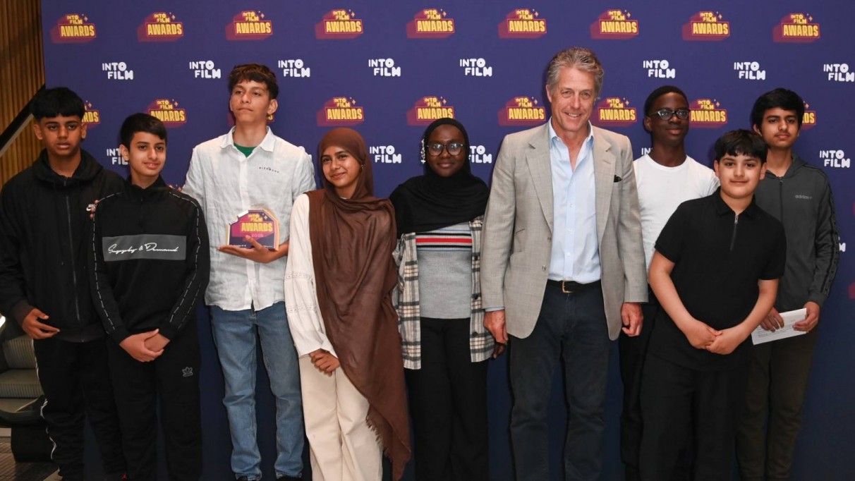 'Animated Voices' filmmakers with Hugh Grant at the 2025 Into Film Awards