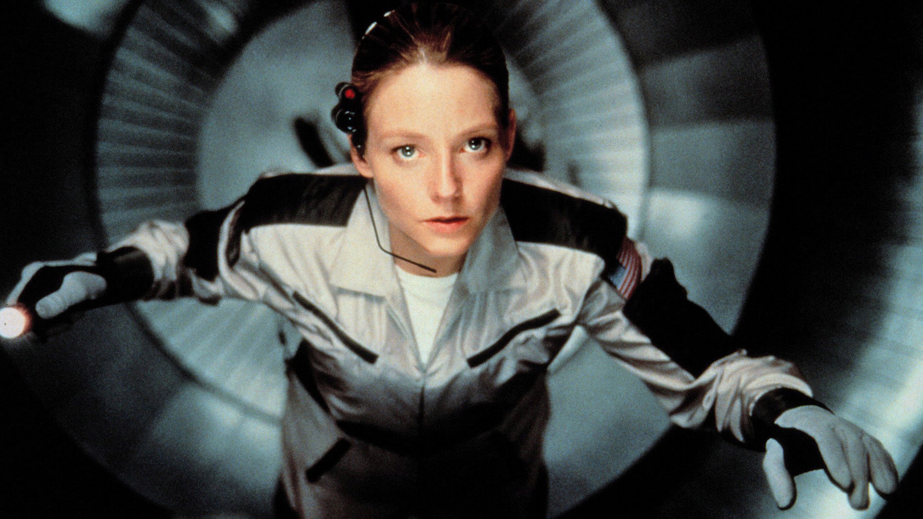 A film guide that looks at Contact (1997), exploring its key topics and the