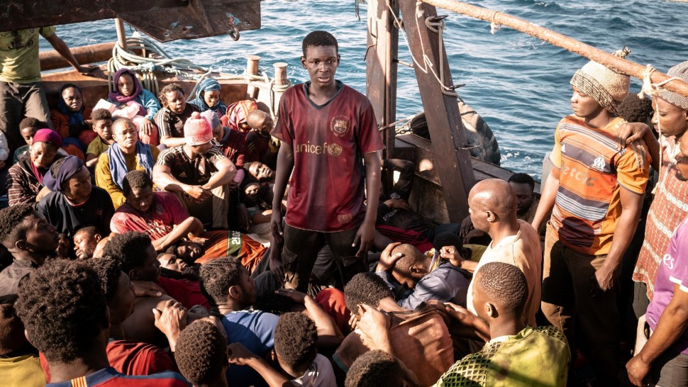 A film guide that uses the film 'Io Capitano' (2023) to explore issues surr